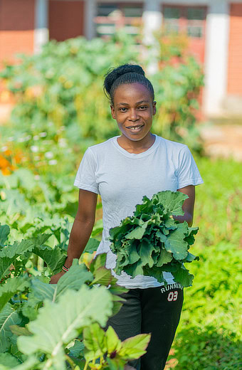 Woman holding greens